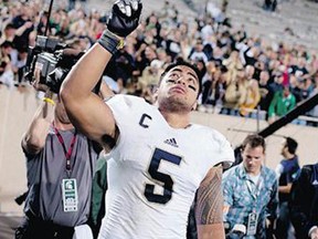 Notre Dame says linebacker Manti Te'o was duped into an online relationship with a woman whose 'death' from leukemia was faked by perpetrators of an elaborate hoax.
(James Brosher, The Associated Press)