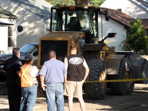 In this file photo, Windsor police and the Ministry of Labour are investigating after a construction worker was struck by a front-end loader on the 1200 block of McKay Avenue on Wednesday, June 1, 2011. The man was taken to hospital where he was later pronounced dead.     (DYLAN KRISTY / The Windsor Star)