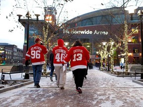 A group of Detroit Red Wings fans make their way to the entrance of Nationwide Arena prior to the start of the game against the Columbus Blue Jackets on January 21, 2013 at Nationwide Arena in Columbus.  (Photo by Kirk Irwin/Getty Images)