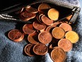 File image of Canadian pennies, which have been phased out of the Canadian monetary system.  The Royal Canadian Mint announced it would no longer distribute pennies as of February 4, 2013.