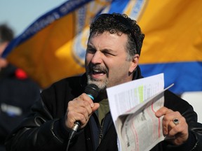 CAW Local 444 president Dino Chiodo speaks at a rally outside Windsor's mail-sorting plant on Walker Road,  Saturday, Feb. 9, 2013. People were protesting Canada Post's proposed service reductions and closure of the historic Sandwich post office. (DAX MELMER/The Windsor Star)