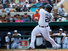 Detroit Tigers first baseman Prince Fielder hits a two-run homerun against the Toronto Blue Jays during first-inning MLB Grapefruit League action Lakeland, Fla., on Saturday, Feb. 23, 2013. Toronto rallied to win 10-3. (THE CANADIAN PRESS/Nathan Denette)