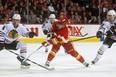 Jiri Hudler #24 of the Calgary Flames takes a shot against the Chicago Blackhawks at Scotiabank Saddledome on February 2, 2013 in Calgary, Alberta, Canada. (Photo by Dylan Lynch/Getty Images)