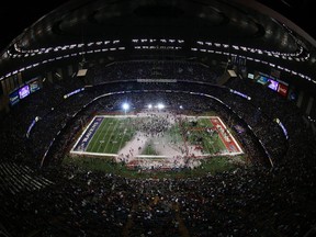 A general view of confetti as it falls on the field in celebration of the Baltimore Ravens 34-31 win against the San Francisco 49ers during Super Bowl XLVII at the Mercedes-Benz Superdome on February 3, 2013 in New Orleans, Louisiana.  (Photo by Rob Carr/Getty Images)