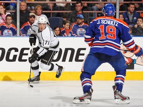 Jordan Nolan #71 of the Los Angeles Kings skates against Justin Schultz #19 of the Edmonton Oilers during an NHL game at Rexall Place on February 19, 2013 in Edmonton, Alberta, Canada. The Los Angeles Kings won 2-1. (Photo by Derek Leung/Getty Images)