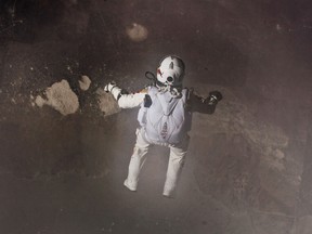 This picture provided by www.redbullcontentpool.com shows pilot Felix Baumgartner of Austria jumping out of the capsule during the final manned flight for Red Bull Stratos on October 14, 2012. The Austrian daredevil became the first man to break the sound barrier in a record-shattering freefall jump from the edge of space, organizers said. AFP PHOTO/www.redbullcontentpool.com/Jay Nemeth/HO