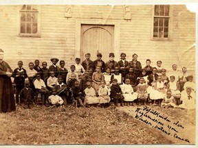 A photograph of a local black orphanage is seen as part of a display about local churches at the Windsor Community Museum in Windsor on Tuesday, February 5, 2013.         (TYLER BROWNBRIDGE / The Windsor Star)