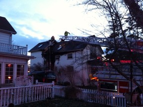 Amherstburg firefighters were battling a house fire Friday evening on Rankin Street. (Twitpic by Doug Schmidt)