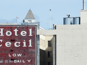 A camera crew films outside of the Cecil Hotel in Los Angeles California February 20, 2013. The body of 21-year-old Canadian tourist Elisa Lam was found in a water tank on the roof of the hotel three weeks after she went missing, police said. The corpse was found February 19 after hotel guests complained of low water pressure. AFP PHOTO/Robyn BECKROBYN BECK/AFP/Getty Images