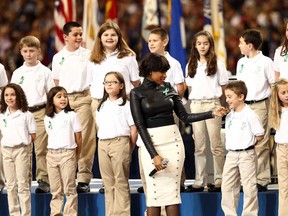A group of 26 students from the Sandy Hook Elementary School in Newtown, Ct. perform America the Beautiful with singer Jennifer Hudson during the Pepsi Super Bowl XLVII Pregame Show at Mercedes-Benz Superdome on February 3, 2013 in New Orleans, La.  (Photo by Christopher Polk/Getty Images)