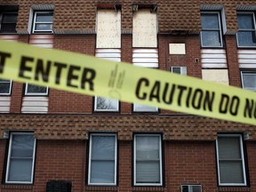 An apartment in the 6600 block of Thornberry Crescent is pictured boarded up Sunday, February 24, 2013.  A 30-year-old male died from an early morning fire at the apartment, Friday, February 22, 2013.  His girlfriend is still in critical condition at hospital.   (DAX MELMER/The Windsor Star)