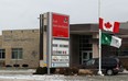 Flags lowered at Ecole Saint-Jean-Baptiste where principal Nicole Larocque and her school mourn the loss of one of their students February 1, 2013. (NICK BRANCACCIO/The Windsor Star)