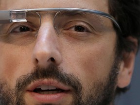 Google co-rounder Sergey Brin wears Google Glass glasses at an announcement for the Breakthrough Prize in Life Sciences at Genentech Hall on UCSF’s Mission Bay campus in San Francisco, Wednesday, Feb. 20, 2013. (AP Photo/Jeff Chiu)