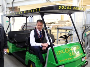 Sean Moore. Founder & CEO at Unconquered Sun Solar Technologies sits in a solar powered people mover vehicle that he handed over to the City of Windsor on February 14, 2013 in Tecumseh, Ontario. (JASON KRYK/The Windsor Star)