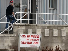 In this file photo, employees are seen entering the Heinz plant in Leamington, Ontario on Thursday, February 14, 2013. Warren Buffett's Berkshire Hathaway and Brazilian 3G Investments purchased the Heinz company for $28 billion. (TYLER BROWNBRIDGE / The Windsor Star)