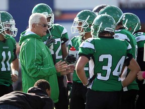 In this file photo, Herman head coach Harry Lumley talks with his team during the WECSSAA senior boys  football game against the Sandwich Sabres at  Sandwich Secondary School in LaSalle, Ont. on October 12, 2012.  (JASON KRYK/ The Windsor Star)