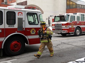 Firefighters pack up after battling a small kitchen fire at 30 Tuscarora Street in Windsor on Tuesday, February 5, 2013. The fire started after a pot was left unattended on the stove. The blaze caused $3000 dollars and was contained to the kitchen. (TYLER BROWNBRIDGE / The Windsor Star)