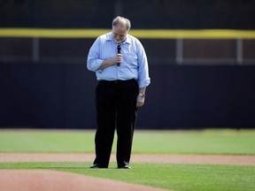 Singer Jeff Fuller reacts after forgetting lyrics to the Canadian national anthem before an exhibition baseball game between the Toronto Blue Jays and the Houston Astros, Wednesday, Feb. 27, 2013, in Dunedin, Fla. (AP Photo/Matt Slocum)