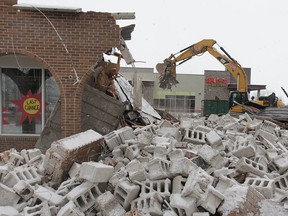 The original Lighting Boutique store on Walker Road, a Windsor business established in 1969, was being demolished Feb. 4, 2013. A new, larger store was built next to it and is now open. (DAN JANISSE/The Windsor Star)