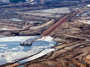 An oilsands facility seen from a helicopter near Fort McMurray, Alta., on July 10, 2012. (THE CANADIAN PRESS/Jeff McIntosh)