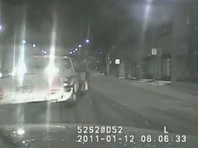 A snowplow is shown closing in on Sgt. Ryan Russell's police vehicle in this still photo taken from video from the cruiser front dashboard. The video was released Wednesday at the trial of trial of Richard Kachkar who has pleaded not guilty to charges of first-degree murder and dangerous driving in Russell's death. THE CANADIAN PRESS/HO