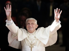 Picture taken on July 8, 2006 of Pope Benedict XVI waving to pilgrims on arrival at the Generalitat Palace in Valencia. Pope Benedict XVI announced on February 11, 2013 he will resign as leader of the world's 1.1 billion Catholics on February 28 because his age prevented him from carrying out his duties -- an unprecedented move in the modern history of the Catholic Church. AFP PHOTO JAVIER BARBANCHO