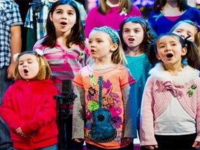 Children from Newtown, Conn., and Sandy Hook Elementary school perform Somewhere Over the Rainbow on ABC’s Good Morning America on Tuesday, Feb. 5, 2013, in New York.
(Photograph by: Charles Sykes , AP)