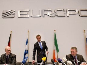 Europol's chief Rob Wainwright (2nd-L) arrives for a press conference in The Hague on February 4, 2013 after the police smashed a criminal network suspected of fixing 380 football matches, including in the Champions League and World Cup qualifiers. "It is clear to us that this is the biggest investigation ever into suspected match fixing," Wainwright told journalists. AFP PHOT / ANP / ROBIN VAN LONKHUIJSEN netherlands out - belgium outROBIN VAN LONKHUIJSEN/AFP/Getty Images
