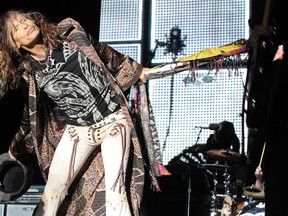 Aerosmith's Steven Tyler performs during concert at the Mondial Loto-Quebec Laval in Laval, Que., north of Montreal, Tuesday July 10, 2012. FOR USE WITH REVIEW OF JULY 10, 2012 CONCERT ONLY. (John Mahoney/THE GAZETTE)
