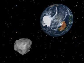 This image provided by NASA/JPL-Caltech shows a simulation of asteroid 2012 DA14 approaching from the south as it passes through the Earth-moon system on Friday, Feb. 15, 2013. The 150-foot object will pass within 17,000 miles of the Earth. NASA scientists insist there is absolutely no chance of a collision as it passes. (AP Photo/NASA/JPL-Caltech)