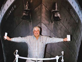 FILE - In this April 25, 2012 file photo provided by Crook Publicity, Australian billionaire Clive Palmer poses in front of an artist impression of the Titanic ll at MGM Studios in Los Angeles, Ca. The Australian billionaire who's planning to build a high-tech replica of the Titanic at a Chinese shipyard has received an "overwhelming" response from people who want to be the first paying passengers. Representatives for Clive Palmer, who in April announced a preliminary agreement with state-owned Chinese company CSC Jinling Shipyard to build Titanic II, said Saturday, Feb. 16, 2013 that his shipping company has received inquiries from people in the U.S., Britain, Asia and South America. (AP Photo/Crook Publicity, File)