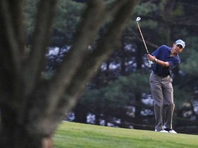 In this file photo, U.S. President Barack Obama plays golf at the Grove Park Inn in Asheville, N.C., on April 23, 2010. (JEWEL SAMAD/AFP/Getty Images)