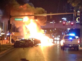 In this Feb. 21, 2013 file photo, law enforcement personal investigate the scene of a mulit-vehicle accident on Las Vegas Blvd and Flamingo Road Thursday, Feb. 21, 2013. Variously known as an adult playground and Disneyland for grown-ups, Las Vegas has worked to brand itself as a place where tourists can enjoy a sense of edginess with no real danger. But a series of high-profile and seemingly random incidents that have left visitors to the Strip dead or in the hospital is threatening Sin City’s reputation as a padded room of a town where people can cut loose with no fear of consequences. (AP Photo/Las Vegas Review-Journal, Jeff Scheid)