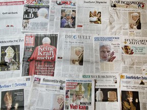 A picture shows German newspapers covering the resignation of Pope Benedict on their front pages on February 12, 2013. The pope's brother said on Monday he has known "for a few months" that Benedict XVI was planning to resign and confirmed that the 85-year-old pontiff was "feeling the burden of his age". AFP PHOTO / ODD ANDERSEN