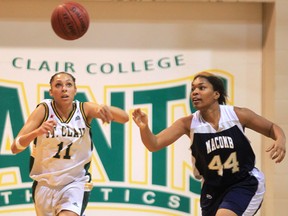 St. Clair College's Bienka Jones, left, and Macomb's Jazmine Kimbrough chase a loose ball in Windsor.  (DAN JANISSE/The Windsor Star)