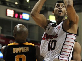 Windsor's Kevin Loiselle, right, drives past London's DeAnthony Bowden at the WFCU Centre. (DAX MELMER/The Windsor Star)