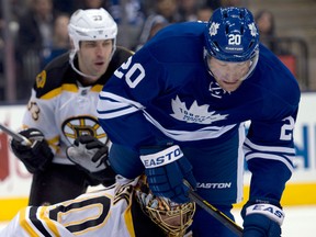 Toronto's David Steckel, right, collides with Boston goaltender Tuukka Rask Saturady. (THE CANADIAN PRESS/Frank Gunn)