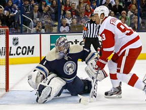 Detroit's Johan Franzen, right, beats Columbus goalie Steve Mason Saturday at Nationwide Arena in Columbus. (Photo by Kirk Irwin/Getty Images)