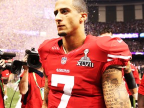Colin Kaepernick of the San Francisco 49ers walks off the field after losing against the Baltimore Ravens in Super Bowl XLVII at the Mercedes-Benz Superdome Sunday in New Orleans. (Photo by Christian Petersen/Getty Images)