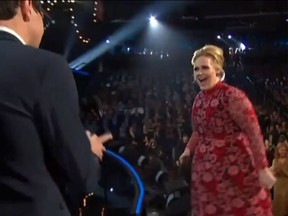 Adele is crashed by Vitalii Sediuk at the 55th Annual Grammy Awards on Feb. 10, 2013. (Screengrab/The Windsor Star)