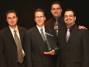 AlphaKOR's Ali Jaber, left, Shawn O'Rourke, Mazen Jaber and Frank Abbruzzese are shown in this file photo receiving the Small Company Service Award at the 2009 Business Excellence Awards.  (Dan Janisse/Windsor Star)