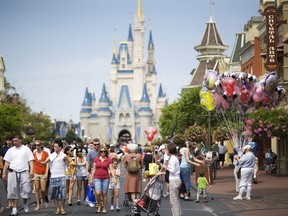 Guests walk along Main Street USA in this file photo. (Matt Stroshane/Bloomberg News)