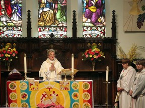 Archdeacon Kim Van Allen presides over Easter services at All Saints Anglican Church in Windsor, Sunday, April 24, 2011. (Windsor Star files)