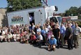 Stafff from Russell A. Farrow, United Way, the CAW and local food banks pose for a photo with a truck that was donated by the Russell A. Farrow Company in Windsor in June 2012. The  company has been recognized as one of the best managed in Canada for the fourth time. (The Windsor Star / TYLER BROWNBRIDGE)