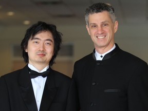 Guest pianist Sheng Cai, left, guest conductor Robert Franz and the rest of the Windsor Symphony Orchestra wooed the audience with a brilliant performance Friday afternoon, Feb. 1, 2013,  at Assumption Chapel. (JASON KRYK / The Windsor Star)