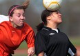 Files: Riverside' s Kiana Crosby, right,  heads the ball while Sandwich's Sydney Hockley at left, presses on senior girls soccer action in LaSalle,  on April 13, 2012. (Windsor Star files)