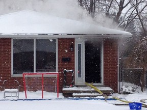 Tecumseh firefighters battled a house fire at 197 Arlington Blvd. on Monday, Feb. 4, 2013. (Handout/Tecumseh fire)