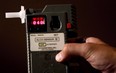 An RCMP Constable holds a breathalyzer test  in this September 24, 2010 photo.