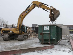 The original Lighting Boutique store on Walker Road, a Windsor business established in 1969, was being demolished Feb. 4, 2013. A new, larger store was built next to it and is now open. (DAN JANISSE/The Windsor Star)