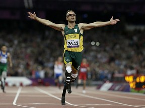 In this Saturday, Sept. 8, 2012 file photo, South Africa's Oscar Pistorius wins gold in the men's 400-meter T44 final at the 2012 Paralympics, in London.(AP Photo/Kirsty Wigglesworth, File)